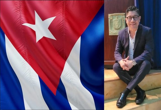 Abel Perez Rojas con la bandera de Cuba